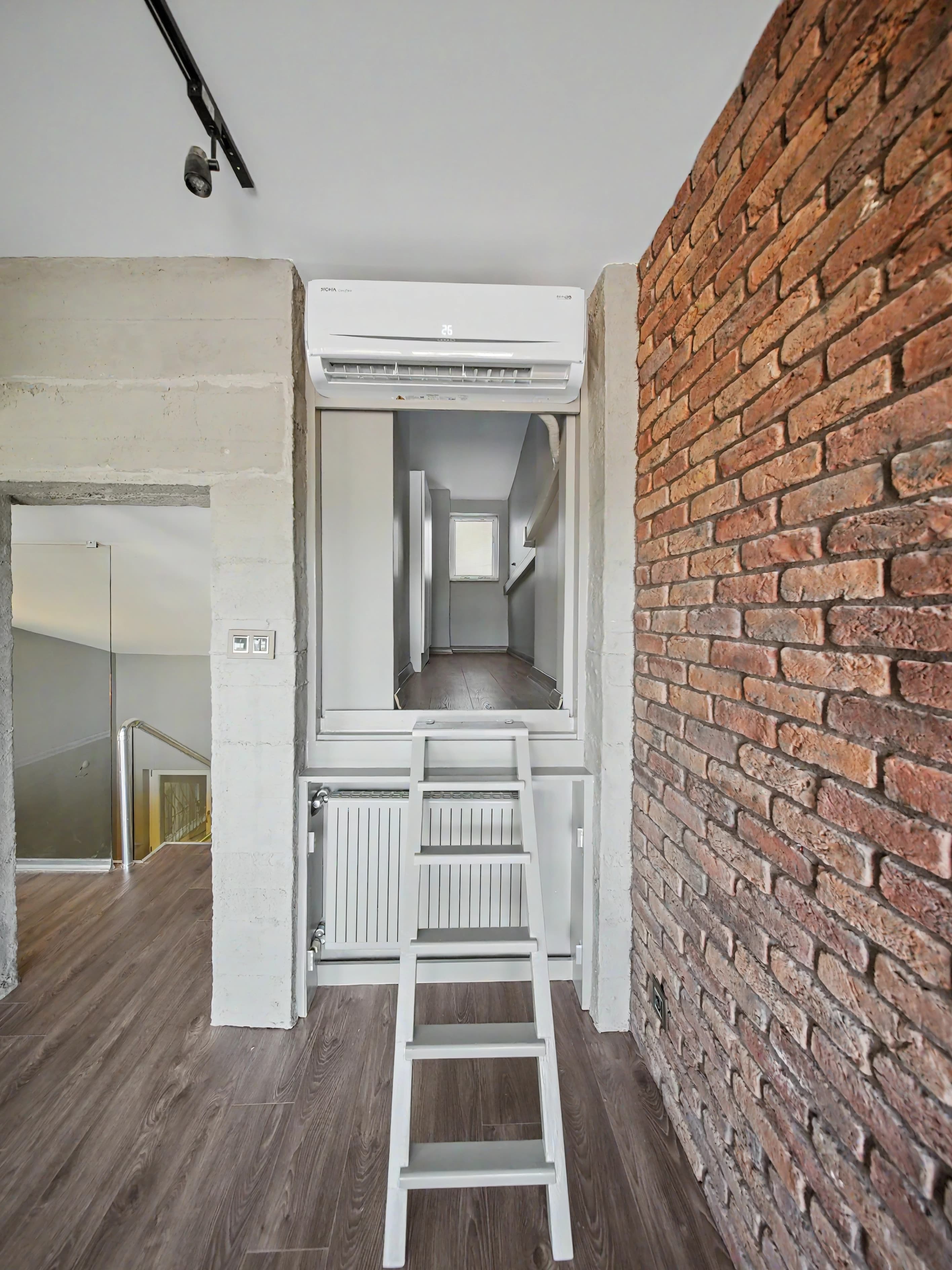 Architectural loft and material detail inside the renovated Yenikoy villa